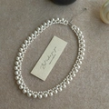 Elegante collana di perle bianche a due fili con catenella di estensione regolabile in argento - Bianco