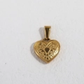 Close-up of golden heart pendant featuring intricate embossed floral textures and bead details - K12-Patterned Heart / Gold