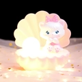 Pink shell night light with cute white cat figurine and glowing pearl bulb on tulle - Night Light / Pink Cat Shell