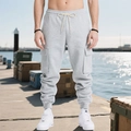 Detail of light gray cargo sweatpants with large side pockets and drawstring waist - S / Light Gray