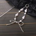 Detail of baroque pearl keychain with silver metal beads and sparkling glitter ball charm - Silver Bow Style Without Stones (K3057)