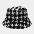 Close-up detail of soft black and white houndstooth plush texture on a winter bucket hat - M (56-58cm) / Black
