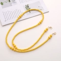 Detail of bright yellow acrylic beaded chain with golden lobster clasps for phone cases - Acrylic Beaded (K1285)