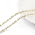 Strand of white oval faux pearl glass beads for DIY jewelry and necklaces - 4×6mm (120pcs/strand) / Off White