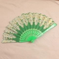 Green plastic folding fan with gold and silver floral embroidery for traditional dance - Green