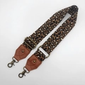 Close-up of leopard print canvas strap with brown leather ends and bronze metal buckles - Antique Bronze Hook / No.20 Brown Leather