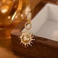 Detailed close-up of a golden sun pendant necklace with zircons on a wooden jewelry box - Gold Sunburst Necklace