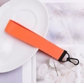 Porte-clés en sangle de nylon orange avec fermoir mousqueton noir et embout - Orange