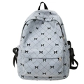 Light blue corduroy backpack with black bow pattern and ribbon straps for women - One Size / Blue