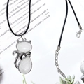 Cat shaped pendant necklace with white crystals on a silver alloy metal frame - With Leather Cord / White Crystal