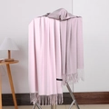 Detail of pink and mauve double-sided cashmere scarf showing soft texture and tassels - No.26 Pink Purple