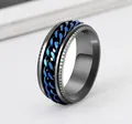 Close-up detail of black titanium steel ring with a rotatable blue chain link center - Size 7 / Black Band with Blue Chain