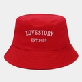 Detail of red bucket hat featuring white Love Story embroidery and cotton twill texture - One Size / Red