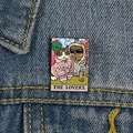 Cat tarot enamel pin featuring THE LOVERS design pinned on blue denim fabric texture - XC707-The Lovers Cat