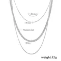 Three-layer titanium steel snake chain necklaces in silver finish showing width details - Silver Steel Triple Layered Necklace Set / Steel