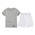 Kids sports set featuring grey short sleeve T-shirt and white elastic waist shorts - Top And Bottom / Gray/White / 100cm