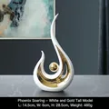 Modern abstract white ceramic sculpture Phoenix Flying with gold foil details for home decor - Phoenix Flying / Large Version / Platinum