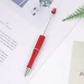 DIY beaded ballpoint pen in metallic red finish with glitter texture and silver tip - Gold & Pink