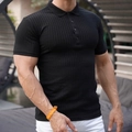 Close-up of men's slim fit black knit polo shirt showing ribbed texture and muscle fit - M / Tops / Black