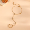 Detail of 18k gold plated slave bracelet with three heart-shaped white gemstones and ring - Gold White Zircon Heart Finger Bracelet (K810)