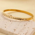 18K gold plated stainless steel bangle with rectangular zirconia on white stone - Pave Rhinestone Hinged Gold Style (sztx053g)