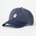 Close-up of ghost embroidery on dark blue washed denim baseball cap with curved brim - One Size / Navy Blue