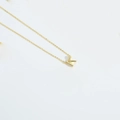 Elegant gold-finished minimalist letter K pendant necklace for women stylish look - Letter K