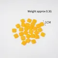 Orange square PVC miniature fruit slices for DIY crafts weighing 0.3g and 1cm size - Mango Style