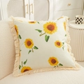 Linen cushion with sunflower digital print and fringe trim on a soft sofa - Sunflower 2773
