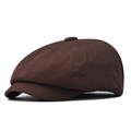Detail of dark brown vintage newsboy cap showing cotton twill texture and side profile - Coffee