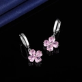 Pink heart clover earrings with S925 silver studs shown on a black reflective surface - Pink Diamond Four-leaf Clover Earrings Led-113