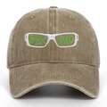 Close-up of FERXXO embroidery and green glasses logo on a brown washed baseball cap - Khaki