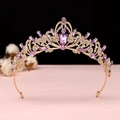 Detailed close-up of Baroque golden tiara with intricate purple crystals and filigree - No.1 KC Gold (Purple Stone)