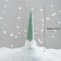 Gnomo di Natale in velluto verde con barba bianca e un'altezza di circa 25 cm - Gnomo Seduto Verde 25cm