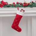 Classic red velvet Christmas stocking with gold embroidery and white plush cuff on mantel - Red Polka Dot