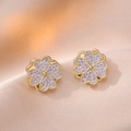 Gold clover stud earrings featuring pave-set purple crystals on elegant satin background - Purple Pavé Four-Leaf Clover (E0170) / Gold/Purple