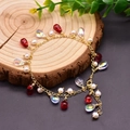 Baroque pearl bracelet with red beads and golden metal chain in a vintage design - Red Crystal Pendant Bracelet