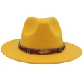 Close-up of yellow wide brim wool fedora hat featuring golden feather buckle and band - Yellow