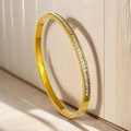 Elegant gold titanium steel bracelet with sparkling zircons on wooden background - Single Row Square Diamonds (29-D-10) / Gold
