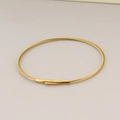 Minimalist 2mm gold-tone stainless steel cable bracelet with cylindrical clasp - Gold Rope Gold Clasp