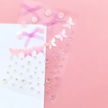 Pink butterfly and rose face gems with iridescent rhinestones on a decorative card - Pink Flower Butterfly Gems (BJA-650)