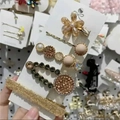 Elegant gold-tone hair clip set with rhinestones and pearls on a white display card - Yellow Small Flower 5-Piece Set