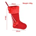 Calza natalizia in maglia rossa con bordo in finta pelliccia e pompon decorativi - Rosso Tipo A