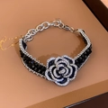 Close-up of camellia crystal bracelet with black beads and sparkling diamond inlay - Camellia Bracelet-Black
