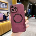 Detail of purple faux suede iPhone case with magnetic ring held in a cafe setting - Burgundy / iphone11pro max