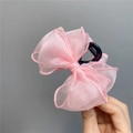 Detail shot of a pink organza bow hair claw clip showing fabric texture and sturdy grip - Pink Claw Clip