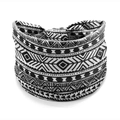 Elastic wide headband with black and white ethnic geometric pattern and center knot detail - Style 115