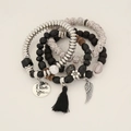 Bohemian multi-layer beaded bracelet set with black tassels and wing charms - Black