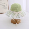 Detail of light green woven sun hat with white lace trim and adjustable chin strap - 52CM (Fits 2-6 Years) / Grass Green