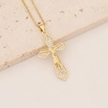 Detailed view of 18K gold plated cross pendant with zircon stones on a textured stone - Crucifix Figure Style (2#)
